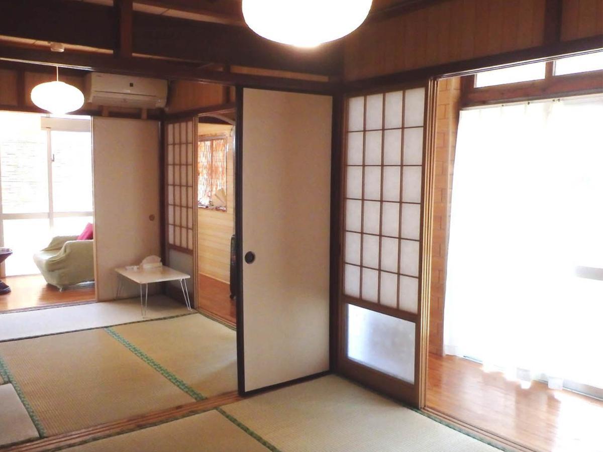 石垣島 一棟貸切りのお宿 ちゅら赤瓦 Ishigaki  Buitenkant foto