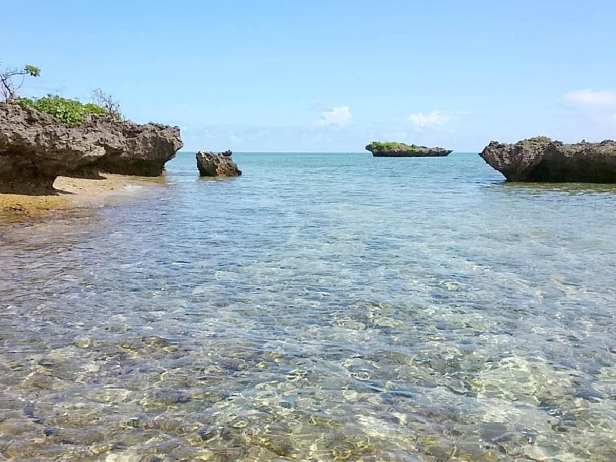 石垣島 一棟貸切りのお宿 ちゅら赤瓦 Ishigaki  Buitenkant foto
